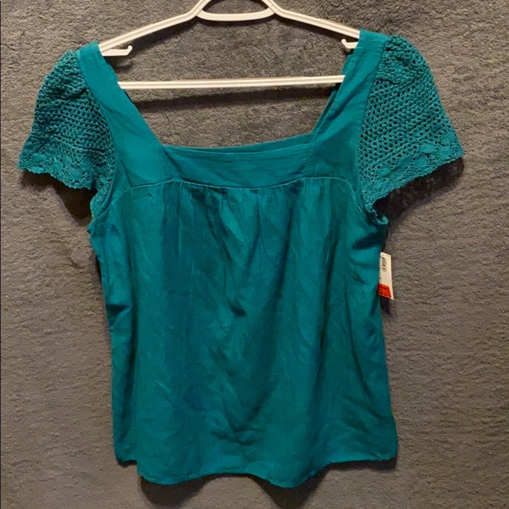 Teal top with crochet sleeves